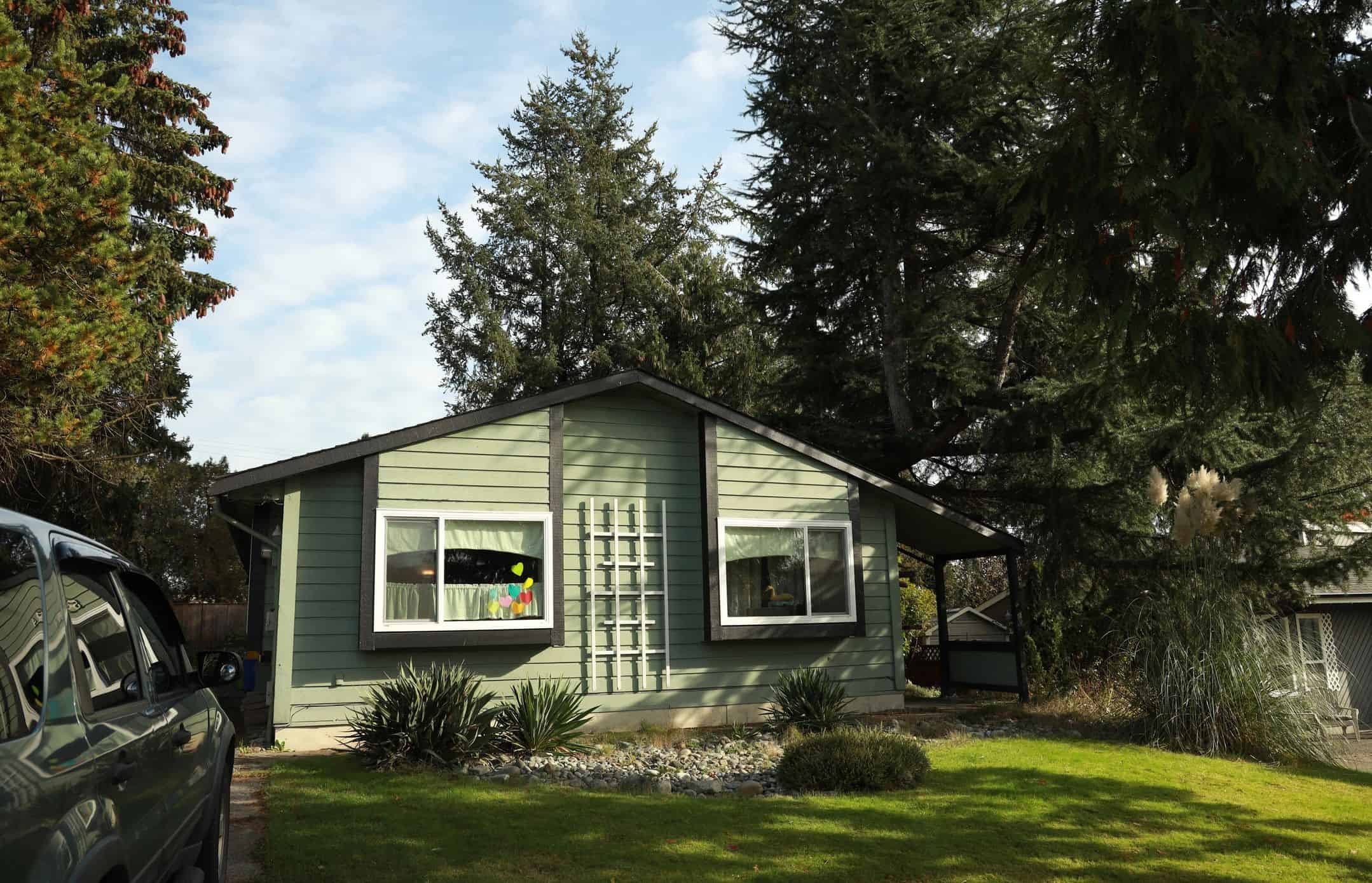 Residential exterior representing detached garage conversion project