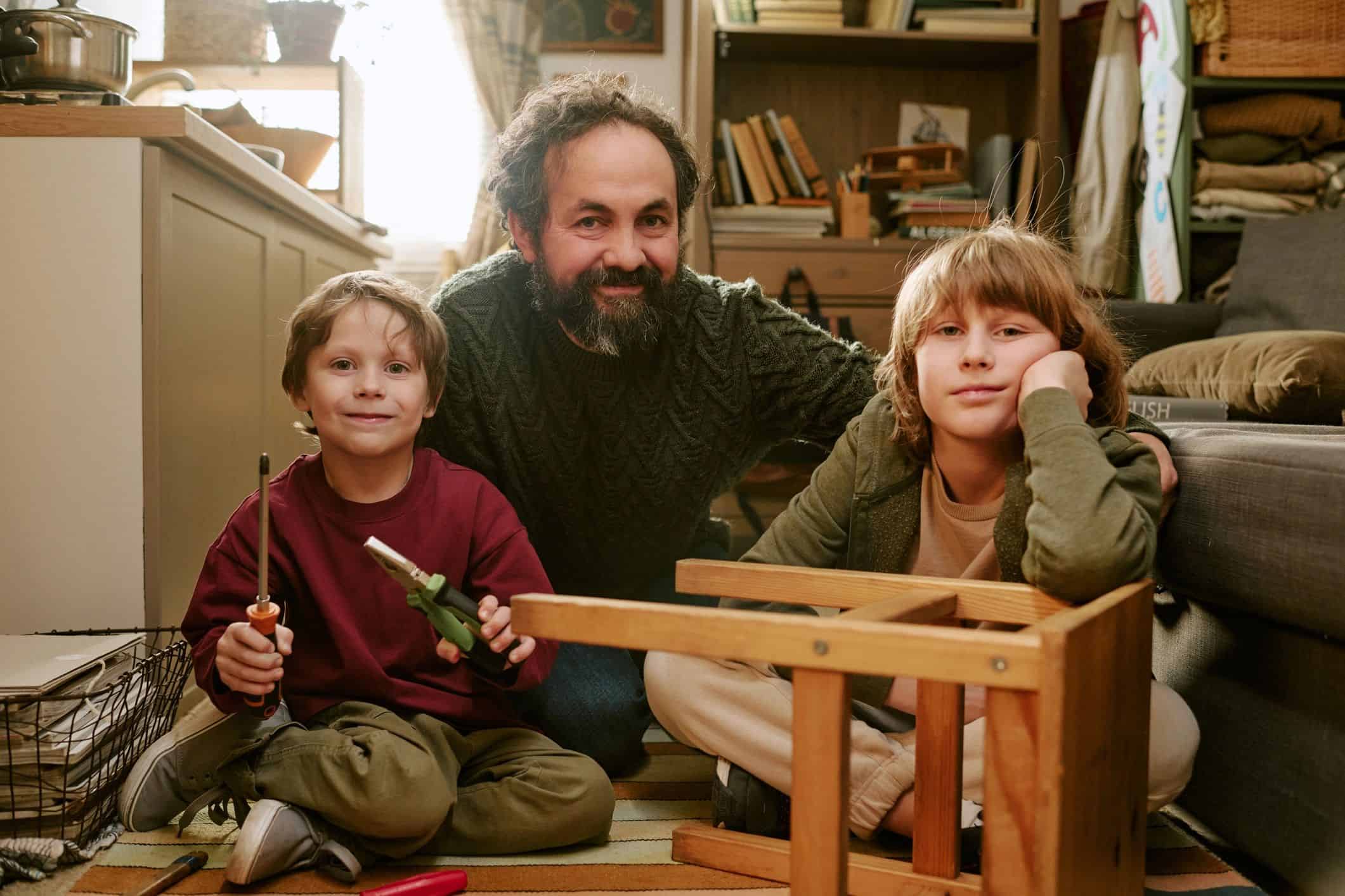 Family working together inside a home during a renovation